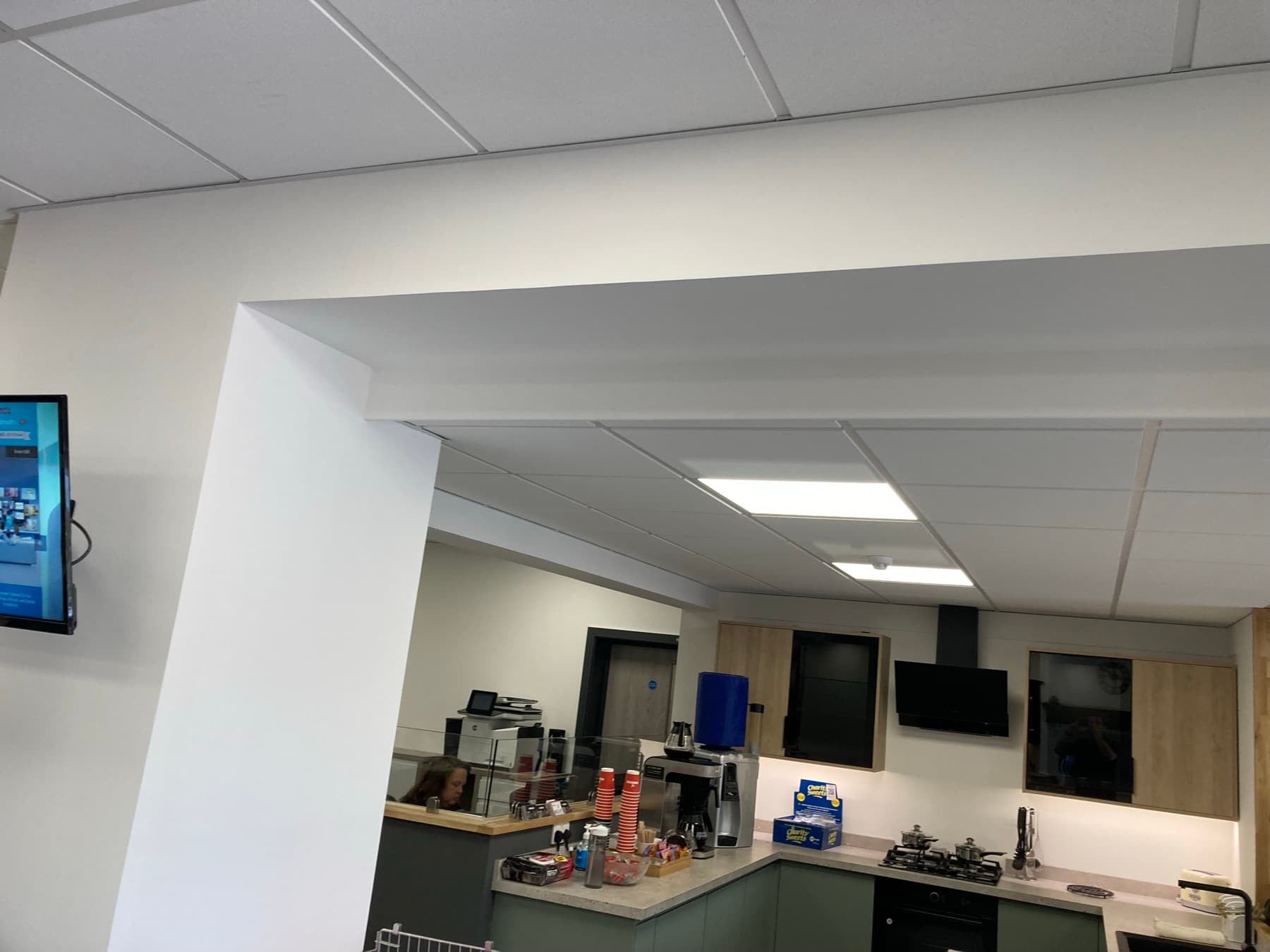 Crisp white ceiling and wall junction with neat cutting-in