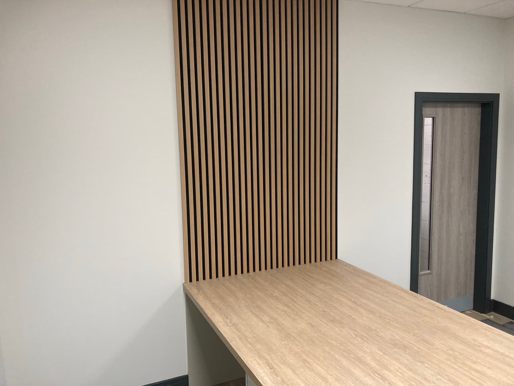 Showroom space with flawless walls and feature lighting